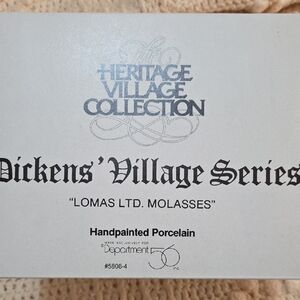 Department 56 Heritage Village Lomas Ltd. Molasses Figurine